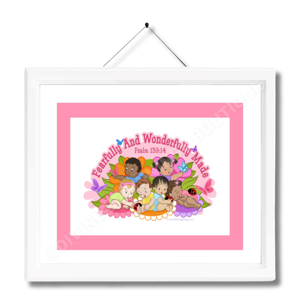 A framed artwork with the title 'Fearfully and Wonderfully Made' featuring a colorful print with floral elements and diverse cartoon children, displayed in a white frame.