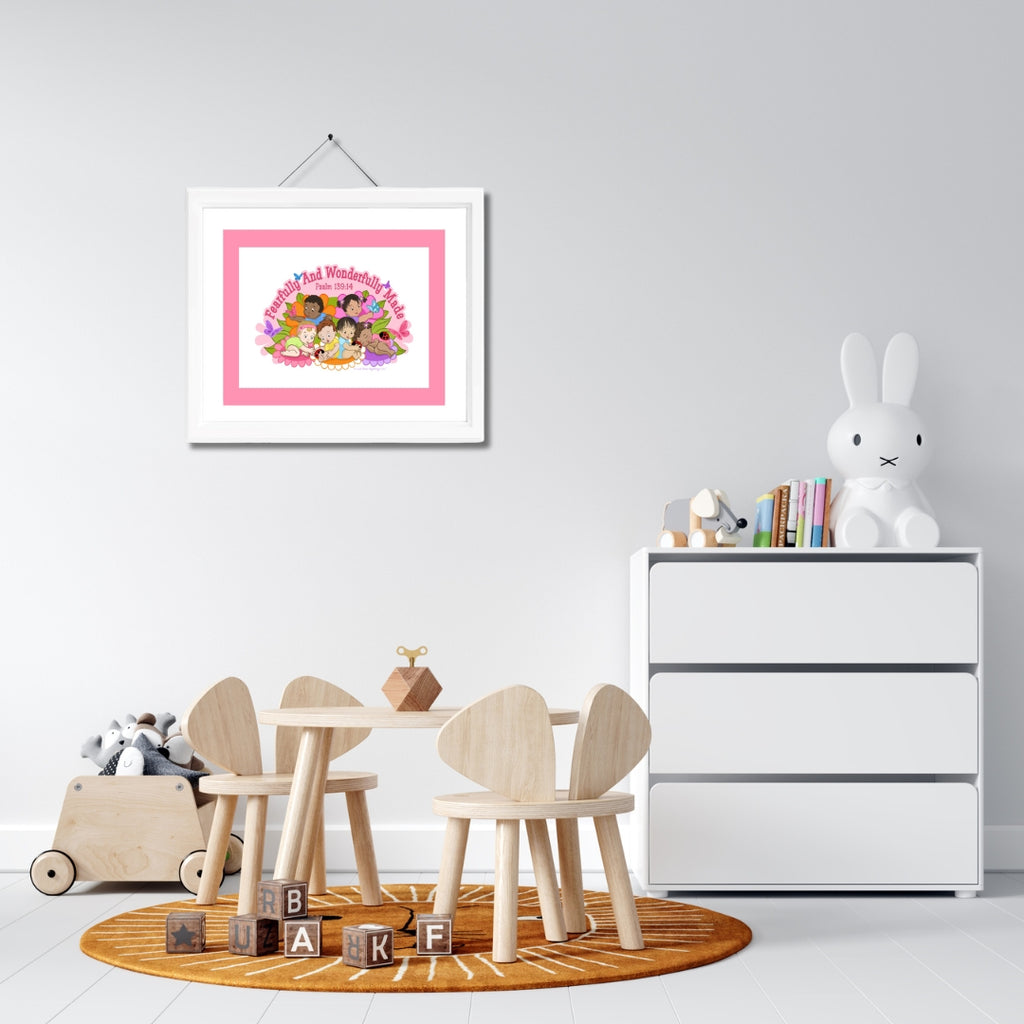 Children's play area with wooden chairs, table, and toys on a white wall.