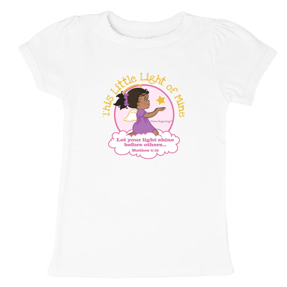 White t-shirt with a graphic of a girl in a purple dress holding a star and text on a white background