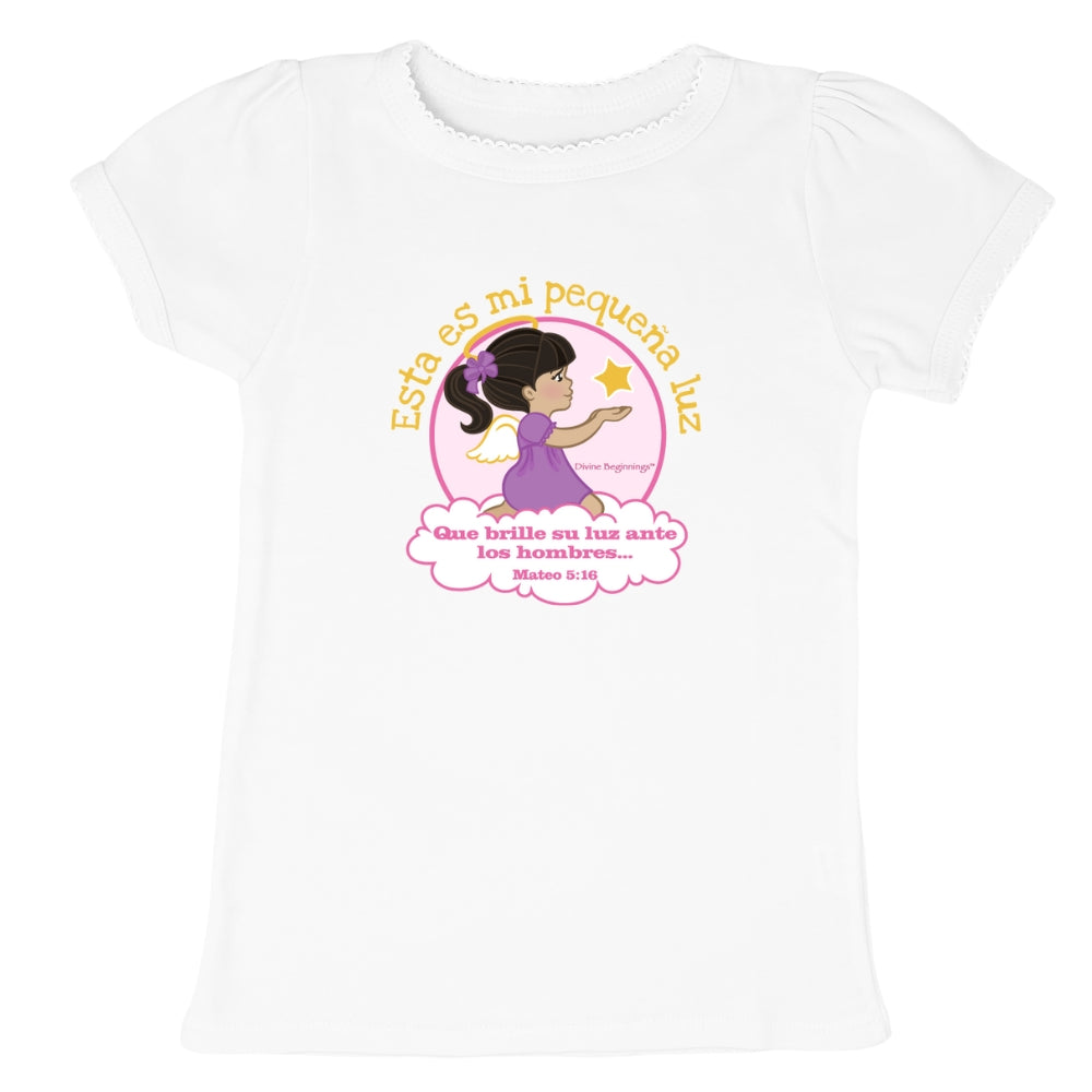 White t-shirt with a graphic of a girl in a purple dress holding a star and text on a white background