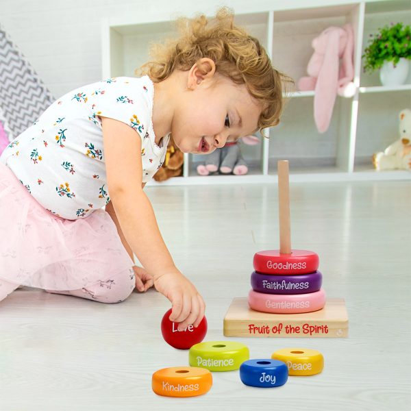 kid playing Faithful Stacks: Fruit of the Spirit Puzzle Rings